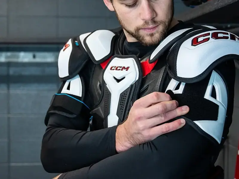 CCM protective gear fitting service showing expert hockey equipment customization and sizing at The Ice Box